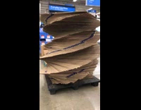 Spiral stack cardboard box tower at Walmart
