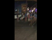 Video of guy enjoying a parade in New Orleans then different guy is laying on the floor. 