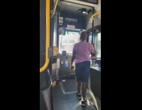 Woman passenger give directions to lost bus driver