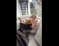 Woman show palm sized pack of pasta