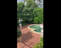 Guy green shirt hold sunglasses excuse me