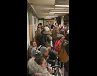 Bunch of girls sings at the train station