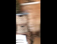 Woman trapped inside shed at garden shop