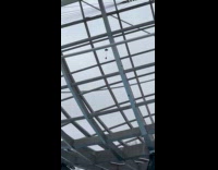 Pair of shoes hang on globe statue