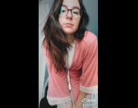 Girl changes pink robe to darth vader 