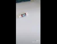 Girl points at tootsie roll blue shirt