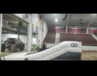 Guy lands a flip jump on a dirt bike