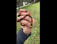 Guy finds red black yellow snake 
