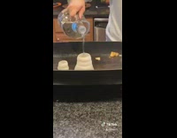 Mom makes onion volcano on grill