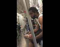 Guy puts plastic bag over foot subway