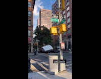 Person carry white mattress on the street