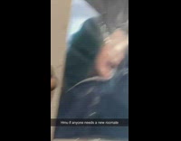 Girl with face in clear screen making faces