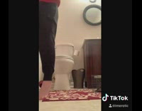 Crazy squirrel inside of restroom 