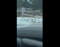 Woman grey robe heels photo shoot snow