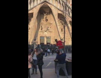 IITW - man red shirt holds tree church pic