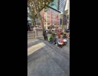 Two person tiktok beside fallen old man