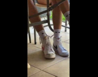 Couple with couple socks under the table