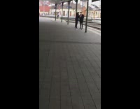 man black jacket empty train station