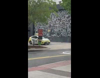 Woman raised her arms and smells her armpit