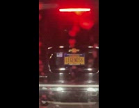 Black car vanity license plate says legends 