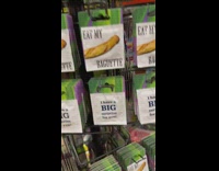 Guy shows different jokes on condom wrapper 