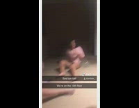 Girl throws yellow nerf football off balcony 