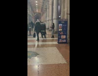 Woman grey pants dance  block way pillar