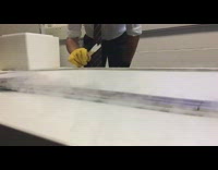 Frozen hockey puck floats above magnets