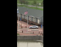 Girl parks car roundabout films tiktok dance 