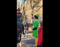 Park ranger and Santas elf making peace