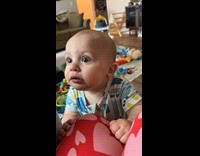 Baby negotiate with mom to bite her knee