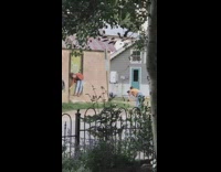 Woman brown coat bend pose door arc