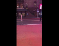 Model bikini heels runway walk empty street nighttime