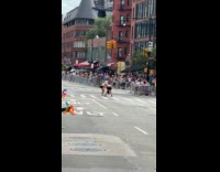 Person twerks in middle of Pride parade