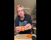 Woman shows orange life hack
