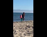 Woman bikini balloon jump shot beach pictorial