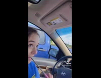 Guy presses dome button in car and looks at girl 