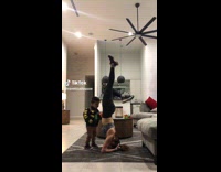 Collab ClipsIG - Woman doing headstand kicked by toddler 