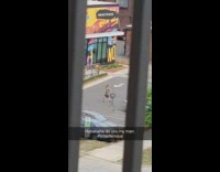 Man tiktok dance on the parking lot with a ring light