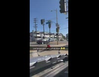 Guy red shirt sign spinning tricks screaming