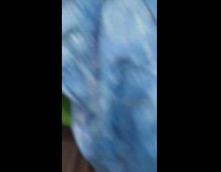 Woman red dress poses upside down inside train