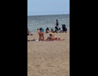 Collab IITW - Woman bikini bend near friends at beach