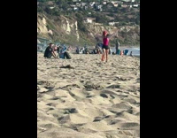 Woman black and red bikini dance around beach Part 2