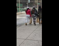 Guy wears biden big head outside 