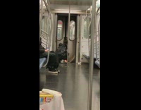 man fire between two trains