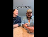 Man and Woman copies and sings in reverse