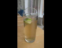 Ginger ale with slice of lime bubble