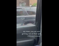 Man in parked car with very tight space