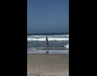 Black bikini girl in beach water selfies 