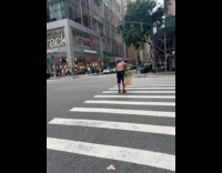 Collab winy - Shirtless man dancing in the middle of pedestrian